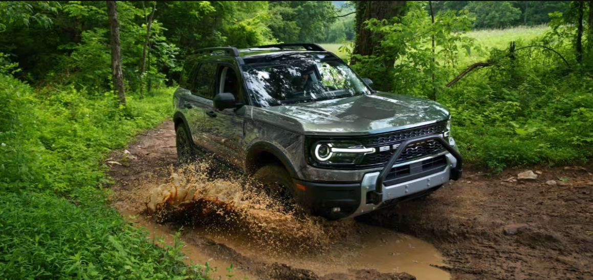 2026 Ford Bronco Sport Badlands on an off-road trail demonstrating ground clearance and G.O.A.T. Modes capability