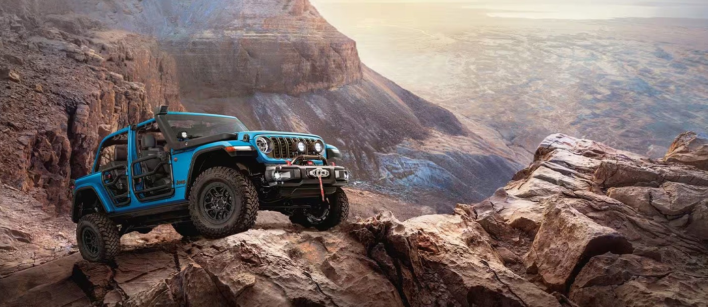 2026 Jeep Wrangler exterior — competitor to the Ford Bronco in the off-road SUV segment, available for comparison at Sarasota Ford