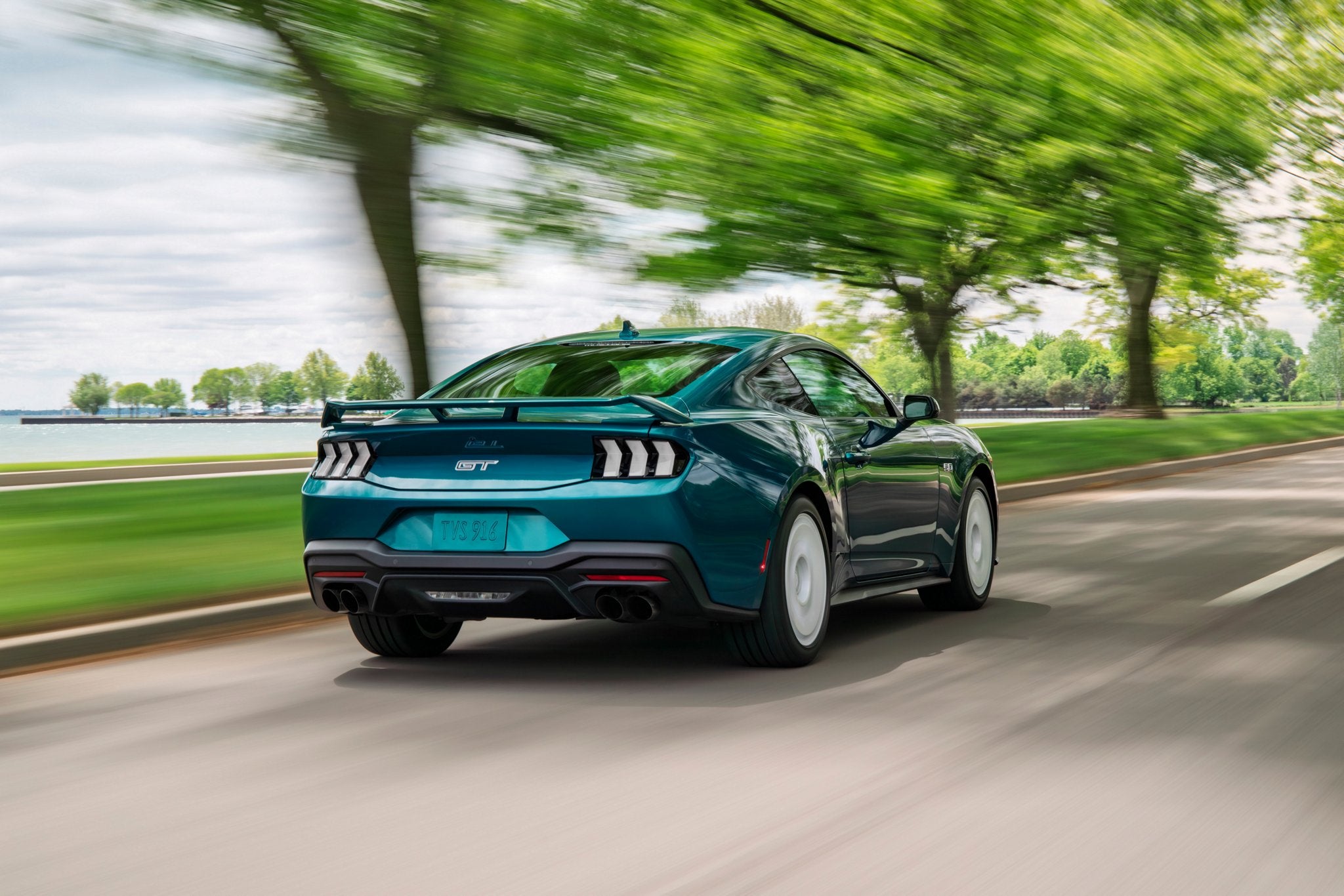 2026 Ford Mustang GT Premium with FX Appearance Package rear view at lakeside